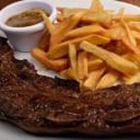 Foto de PORCION DE ASADO CON PAPAS FRITAS