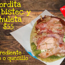 Foto de Gordita con bistec y chuleta 