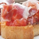 Foto de Tostada Integral Serrano Tomate