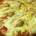 Foto de Muzza, palmitos y salsa golf