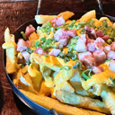 Foto de PAPAS CON CHEDDAR Y BACON