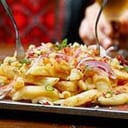 Foto de Papas Fritas Panceta Y Puerro