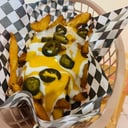 Foto de Papas gajo con queso cheddar