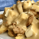 Foto de Papas Fritas Con Pollo y Queso