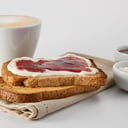 Foto de COMBO 7: Cafe con leche + 2 tostadas en pan de Campo/Semillas/Integral, queso crema y mermelada