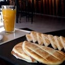 Foto de COMBO 4: Tostado jamón y queso + jugo exprimido de naranja