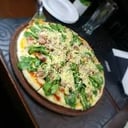 Foto de Crudo y rúcula