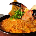 Foto de Pastel de Jaiba o Camarón ( librillo cremoso de mariscos a elección horneado y gratinado con queso, acompañado de papas rustica)
