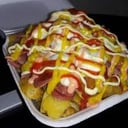 Foto de Salchipapa gratinada