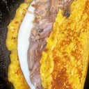 Foto de Cachapa con Queso de Mano y pernil de cerdo