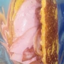 Foto de Cachapa con Queso de Mano, jamón ahumado y tocineta