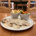 Foto de Pollo en salsa de champiñones 