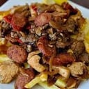 Foto de Chorrillana mixta  vacuno y pollo 