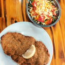 Foto de Milanesa de pollo con guarnición