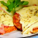 Foto de Milanesa napolitana con guarnición 