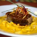 Foto de FILETE CON FETUCCINI EN SALSA A LA HUANCAÍNA
