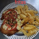 Foto de Suprema napolitana con fritas