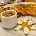 Foto de Patacones con Hogao y Guacamole