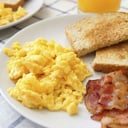 Foto de Huevos con Tocino + cafe + jugo