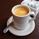 Foto de cafe o cortado en jarrita