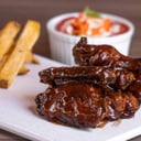 Foto de Alitas ( BBQ - BUFFALO - CROCANTE - ANTICUCHERA)