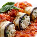 Foto de Berenjena con ricota en salsa de tomate