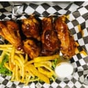 Foto de ALITAS (BBQ, MANGO HABANERO y LEMON PEPPER