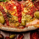 Foto de Muzarella con jamón y morrones