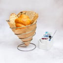 Foto de canastilla de panes artesanales Crepes & Waffles. 