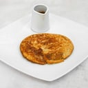 Foto de pancake de avena con manzana y miel 