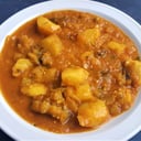Foto de Aloo Baigan Masala