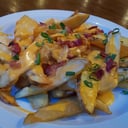 Foto de Papas Rusticas con cheddar y panceta