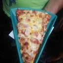 Foto de Porción de Pizza Hawaiana