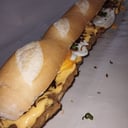 Foto de sannguchazo de milanesade cheddar, huevos,panceta y verdeo