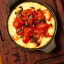 Foto de Provoleta Putanesca