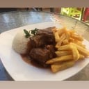 Foto de CARNE MECHADA CON ARROZ Y PAPAS FRITAS