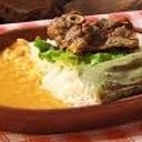 Foto de Seco de cabrito con tamal