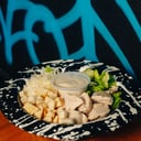 Foto de Caesar con pollo
