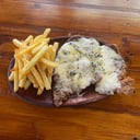Foto de Milanesa con roquefort + guarnición