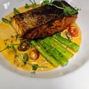 Foto de Salmon a la Toscana con sofrito de tomate cherry