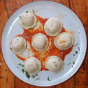 Foto de Sorrentinos de jamón y mozzarella con salsa filetto