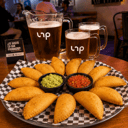Foto de Combo 2 Empanadas x 12 Und + Jarra 1.5 Cerveza Nacional L