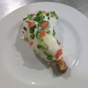 Foto de 1/4 de pollo deshuesado al verdeo