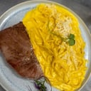 Foto de ATÚN ALA PLANCHA CON FETTUCCINE EN SALSA HUANCAINA