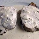 Foto de LOMO VACUNO A LOS 4 QUESOS CON GUARNICIÓN