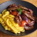 Foto de Fetuccini en salsa Huancaina con Lomo Salteado
