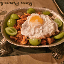 Foto de Migas ruleras con huevo frito ecológico Rujamar  y uva 