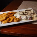 Foto de Ojo de bife a la crema pimienta.