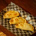 Foto de Empanada de cebolla y queso