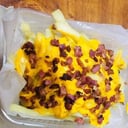 Foto de Bandeja de Papas con Cheddar y Bacon